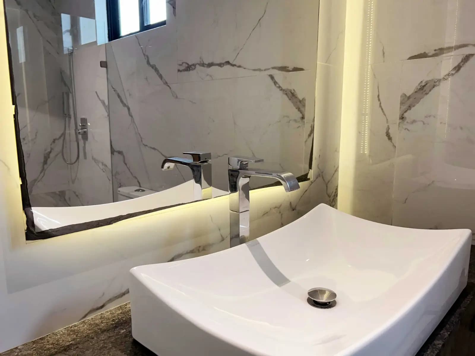 Casa Marina in Puerto Cancun, Bedroom suite with media wall