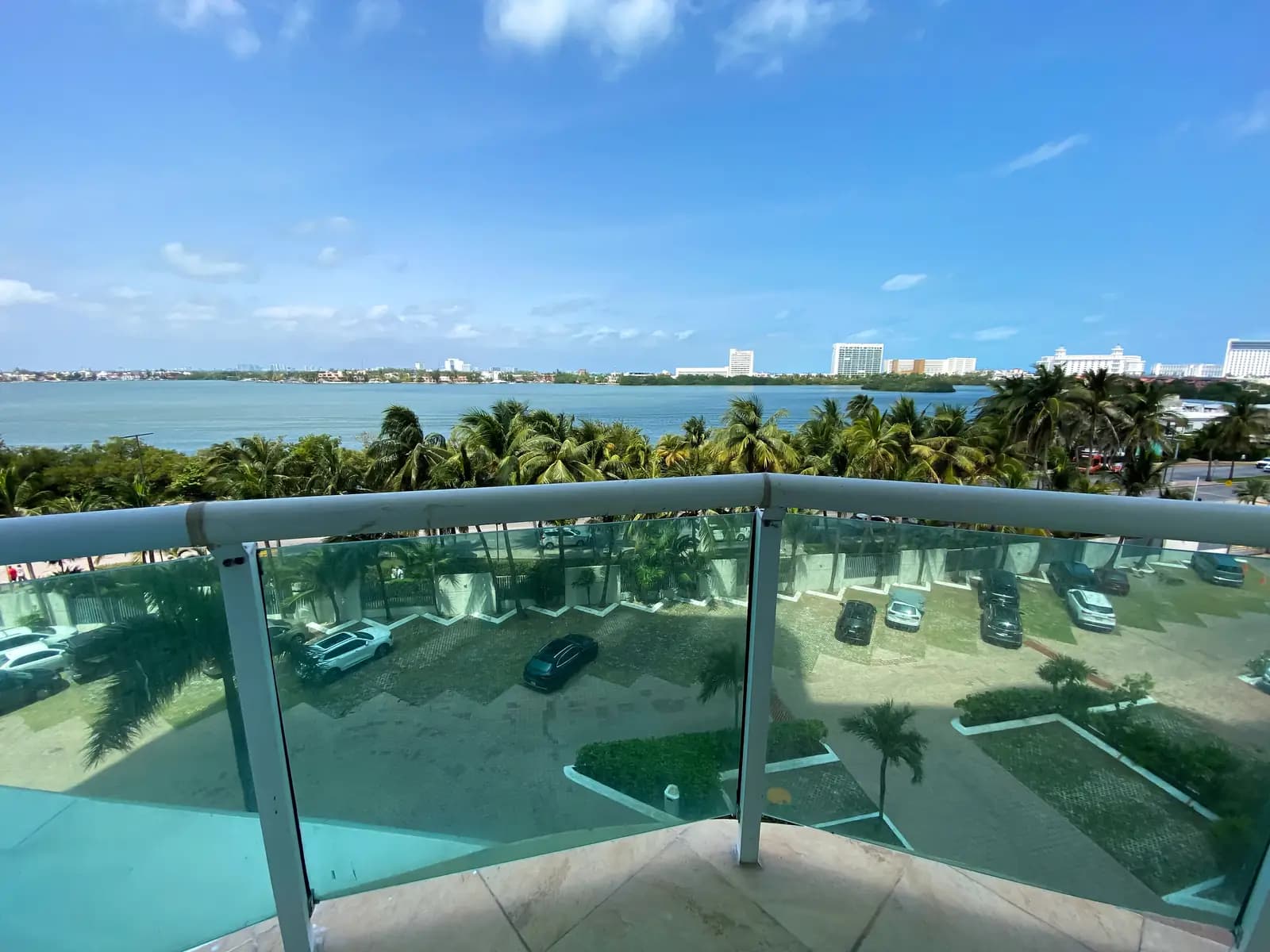 Beachfront Residence at Bay View Grand, Terrace seating with lagoon and sea view