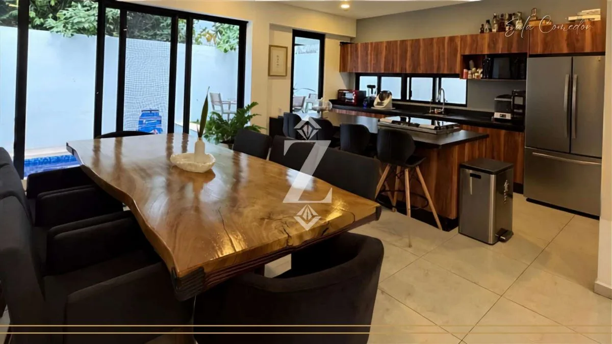 Cocina abierta y comedor en Residencial Aqua, Cancún
