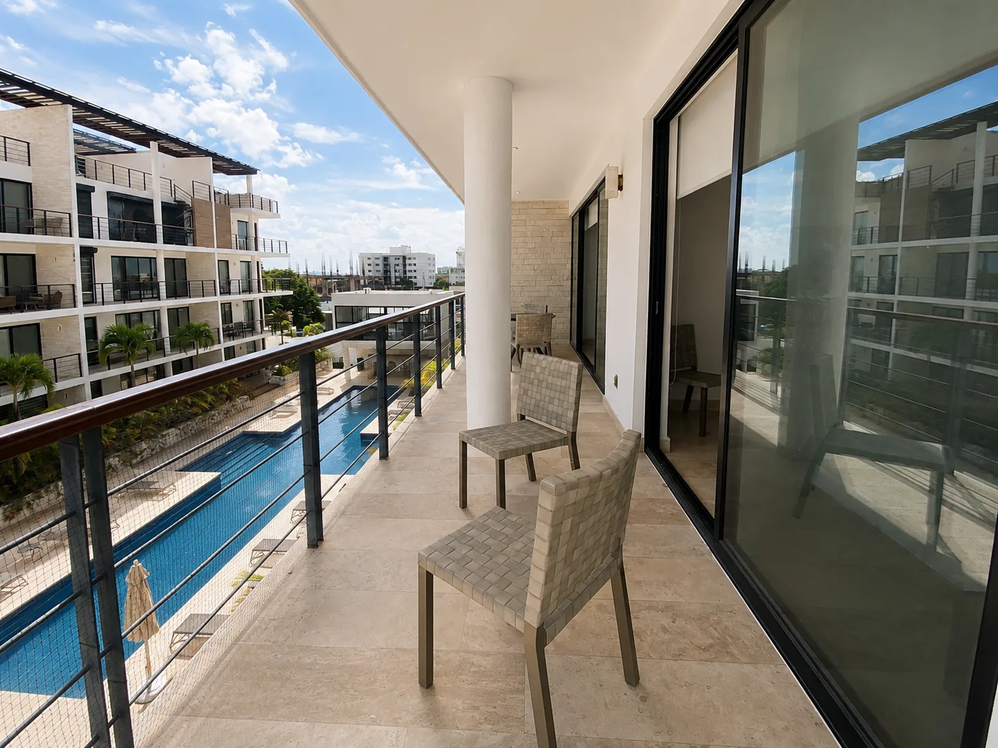 Terrace with pool view at Palmar Residencial, Cancún