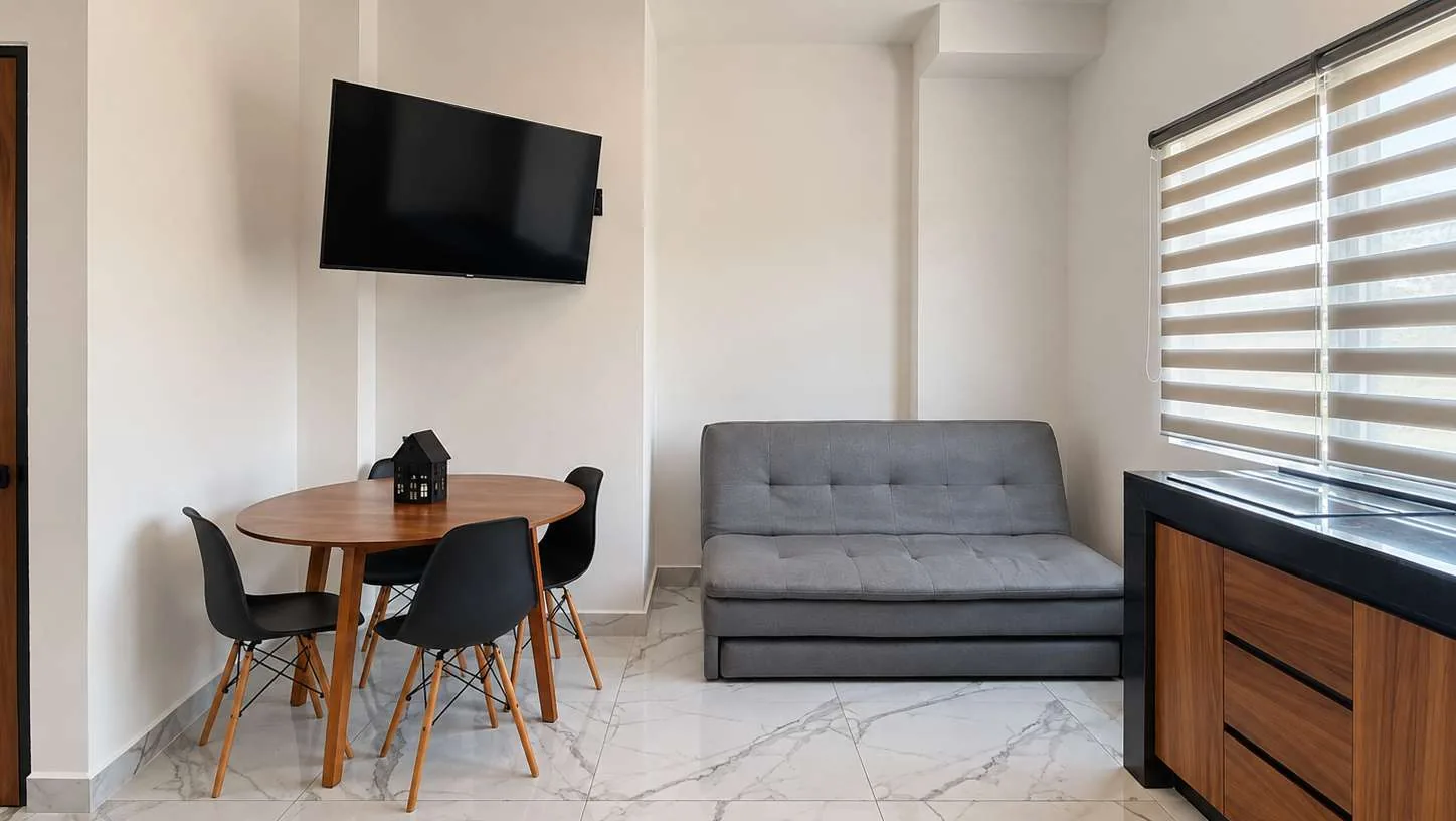 Cocina y área social de loft en Cumbres, Cancún